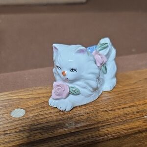 Porcelain Cat Figurine with Pink and Blue Accents